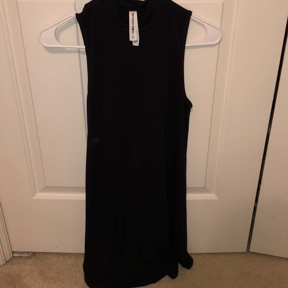 High neck, black dress